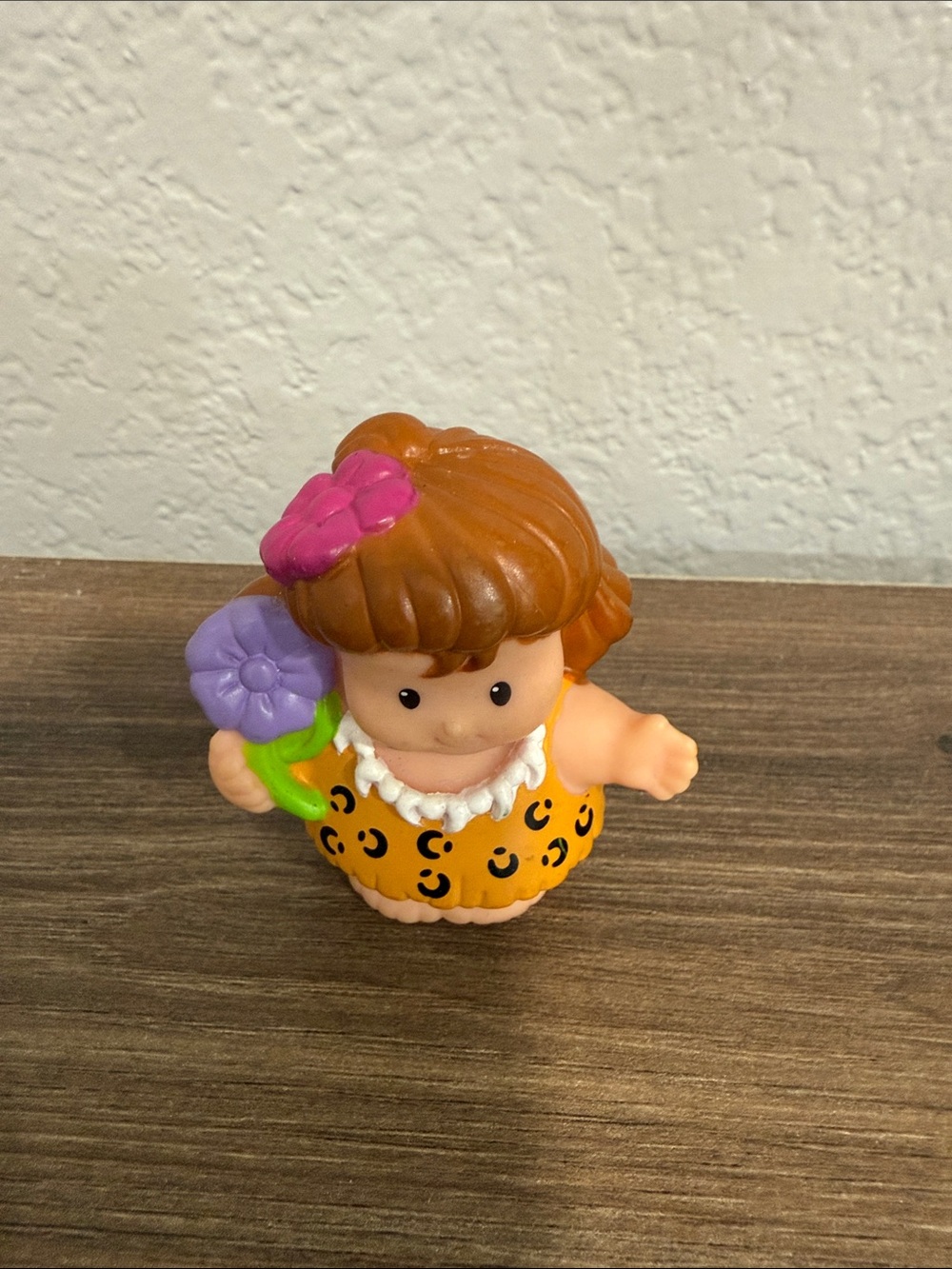Fisher-Price Little People Cave Woman figure from the Dino Dinoland playset